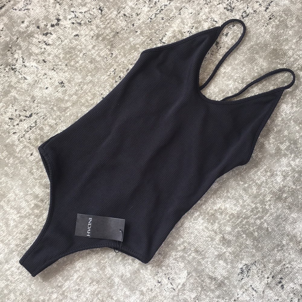 Indah One Piece size small